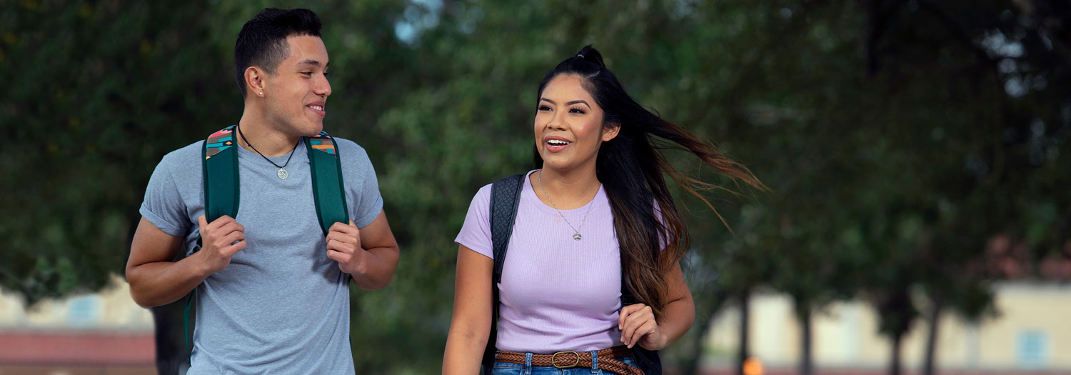 Two Students Walking on the kingsville campus