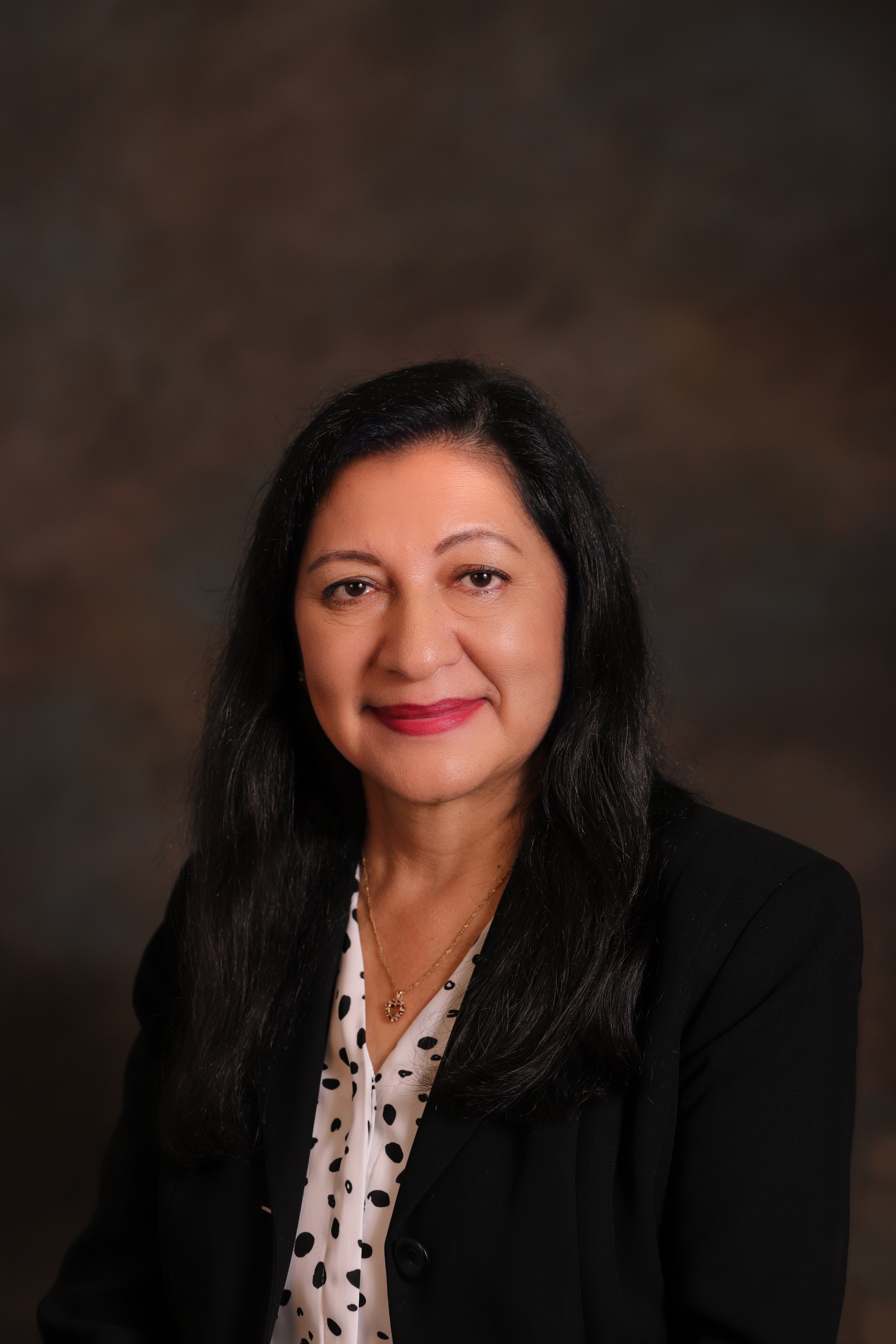 Dr. Lucy M. Camacho
