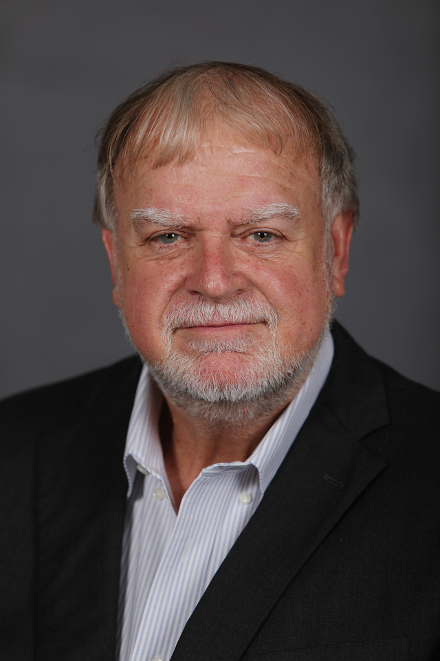Dr. Michael E. Tewes