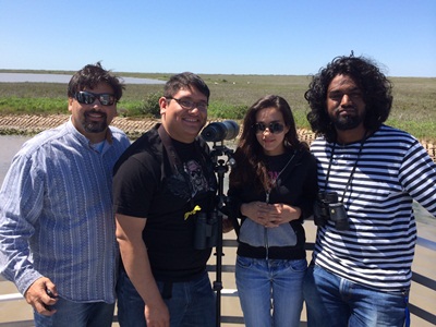 Dr. Bohm outside with students 