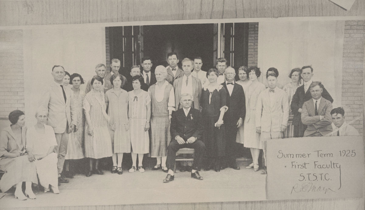 Group photo of faculty and staff outside of Manning Hall