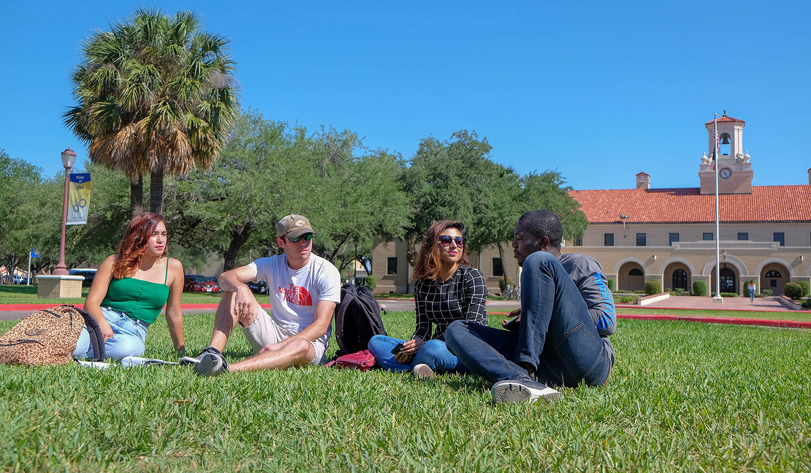 Photo Of Students socializing on University Blvd