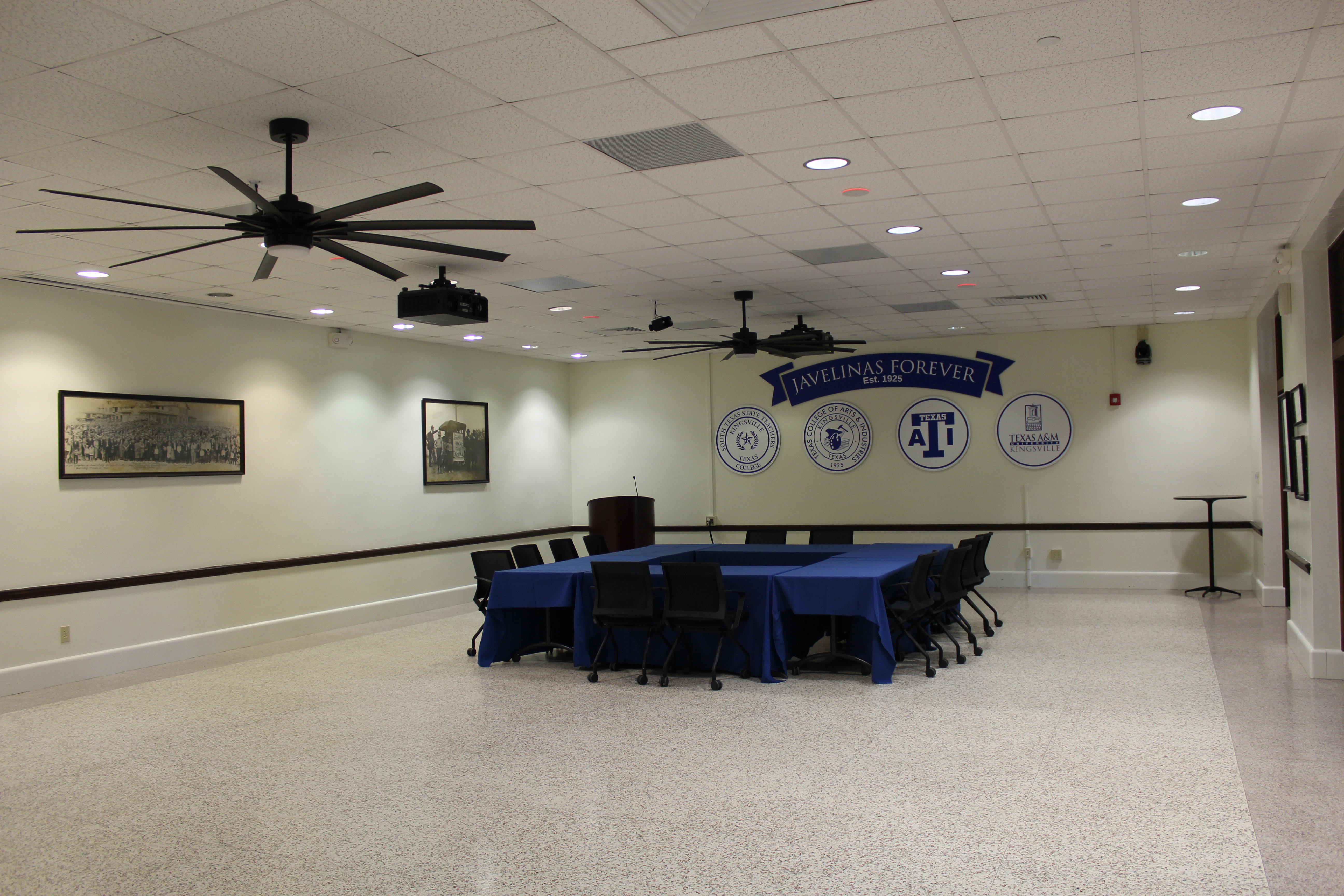 The Founders Room Dining Room, featuring an alternate angle of the square table setup.