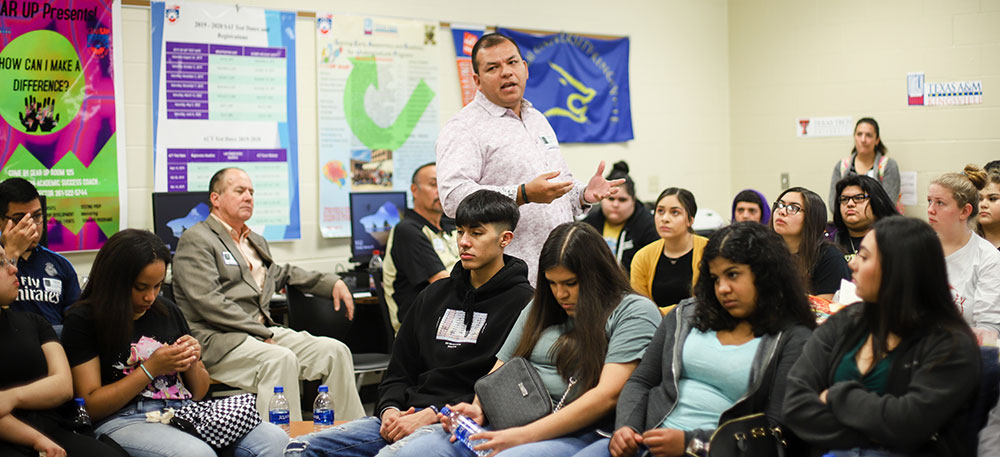 Sergio Tinoco speaks to students at H.M. King High School.