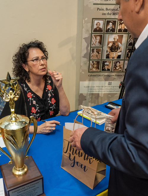 Colonel Lisa Carrington Firmin, USAF (Ret.) signed copies of her book Stories from the Front: Pain Betrayal, and Resilience on the MST Battlefield during the book launch held on Tuesday, April 26, at the John E. Conner Museum at Texas A&M University-Kingsville.