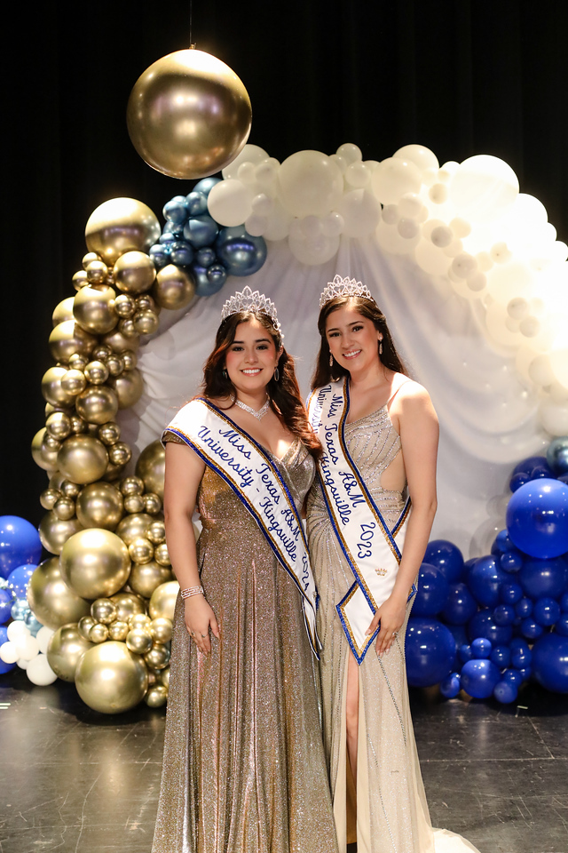 Two pageant women smiling for camera. 