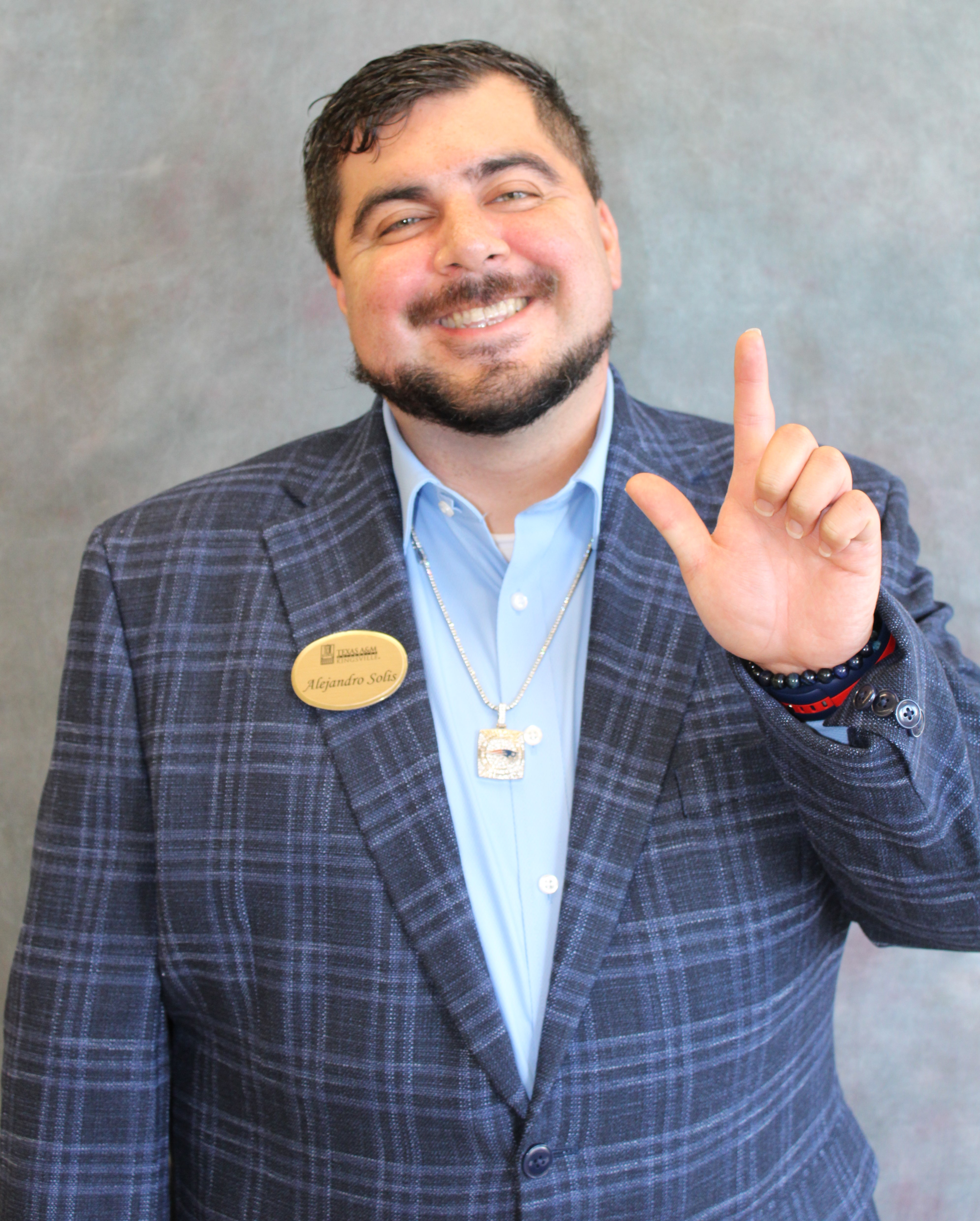 Alejandro Solis Holding up the J-Sign