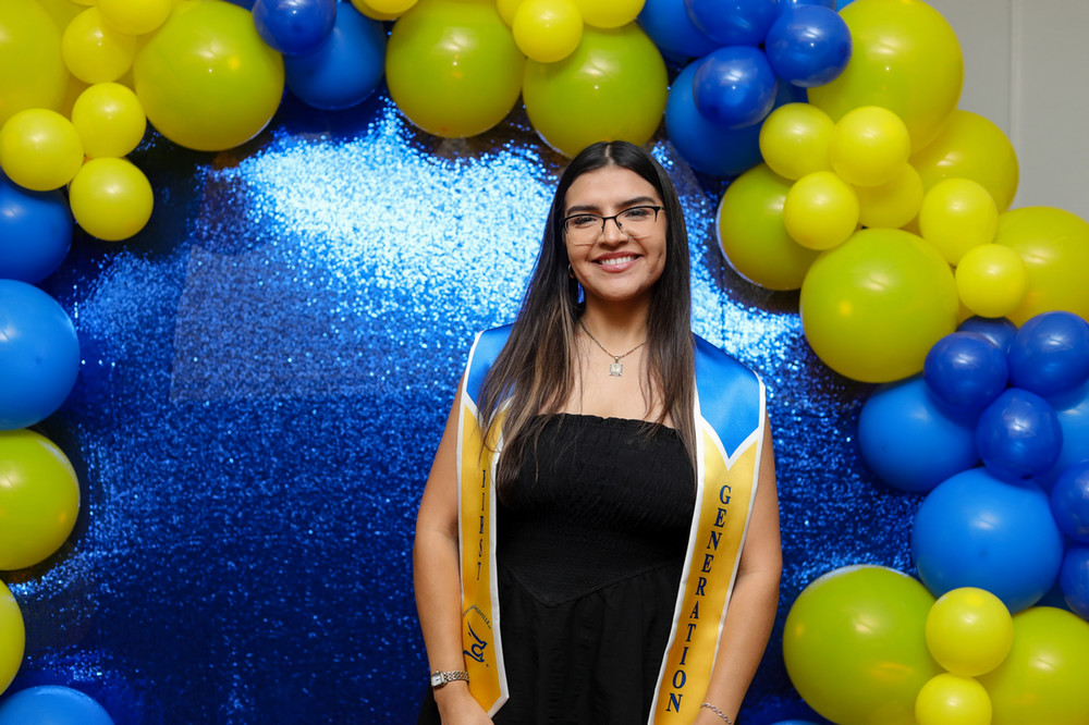 Image of a first-generation female TAMUK students who received her stole